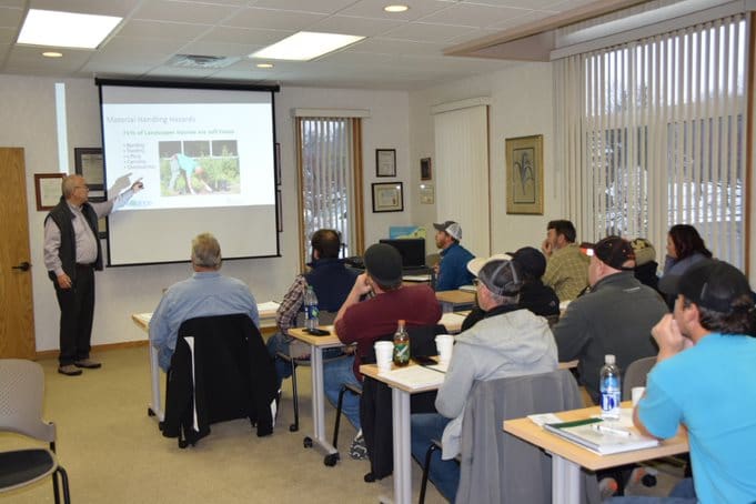 Online OSHA safety training video class on laptop